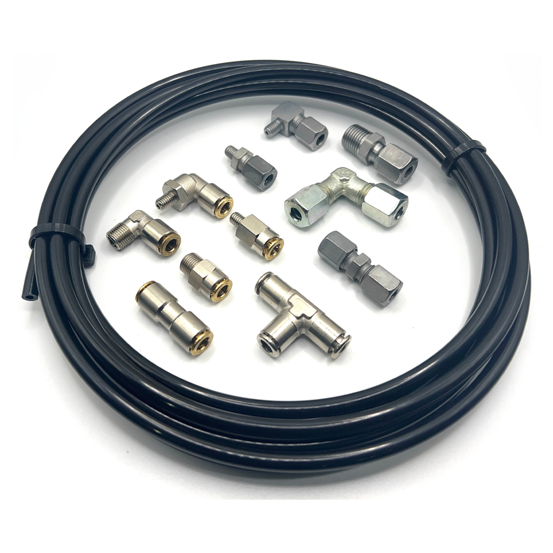 Assortment of 6mm nylon tubing and compression and push-in fittings designed for flexibility and durability in high-pressure lubrication systems