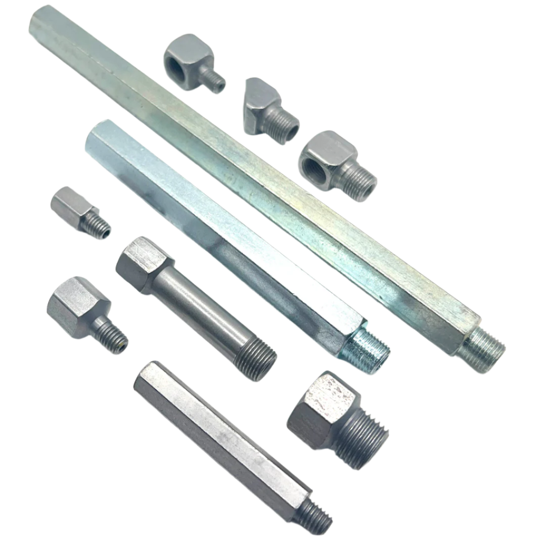Various types of adaptors and reducers including elbow, straight, and extension types designed for customizing and extending lubrication systems, featured in a clear and informative product category layout