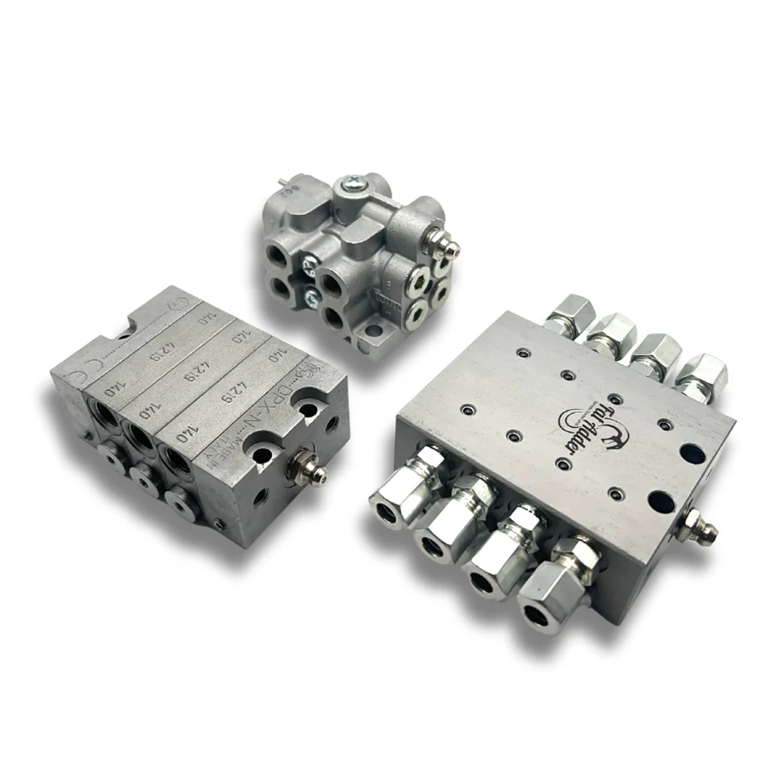 Selection of Grease Divider Valves including ALDV, DDV, and SDV models designed to ensure precise and efficient lubrication distribution across multiple points in machinery, featuring high-quality construction for demanding environments