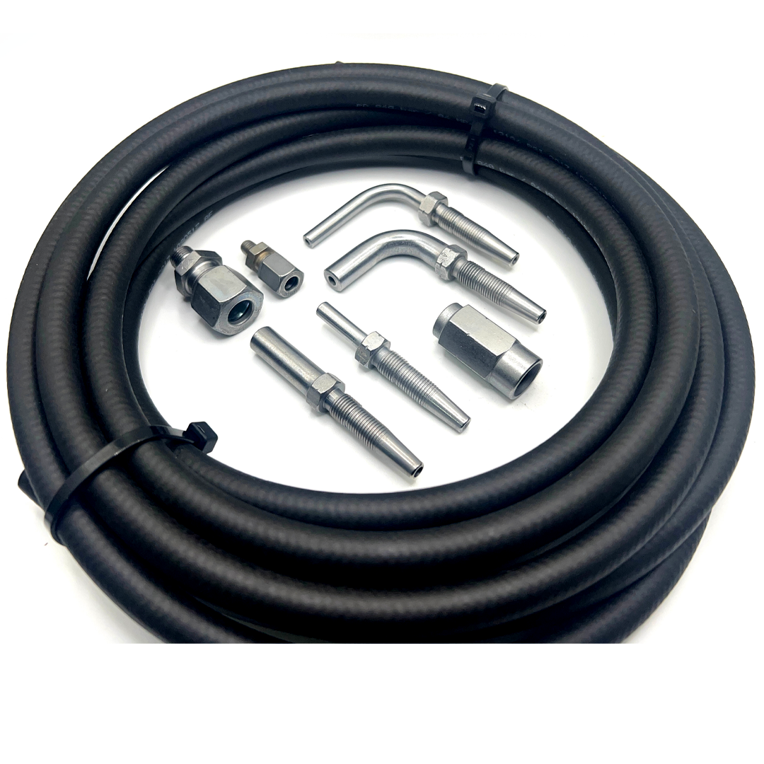Various components of the 11.3mm High Pressure Grease Hose System including 90 Degree Compression Fitting, Compression Nuts and Olives, High Pressure Hose, and Hose Studs arranged for industrial use